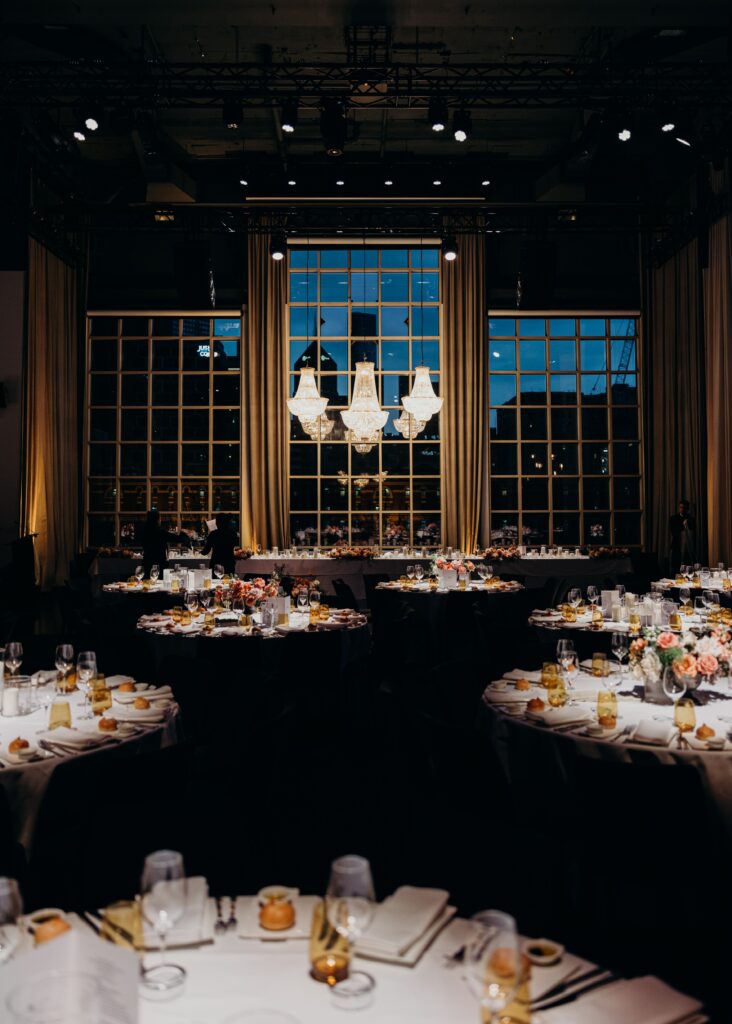 Bride and groom walking into elegant Melbourne wedding venue – planned by Eleven Out of Ten Events